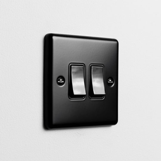 Matt Black 2 Gang 2 Way Switch On A Light Grey Background