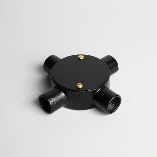 Matt Black 20mm Conduit Cross Box ON Light Grey Background