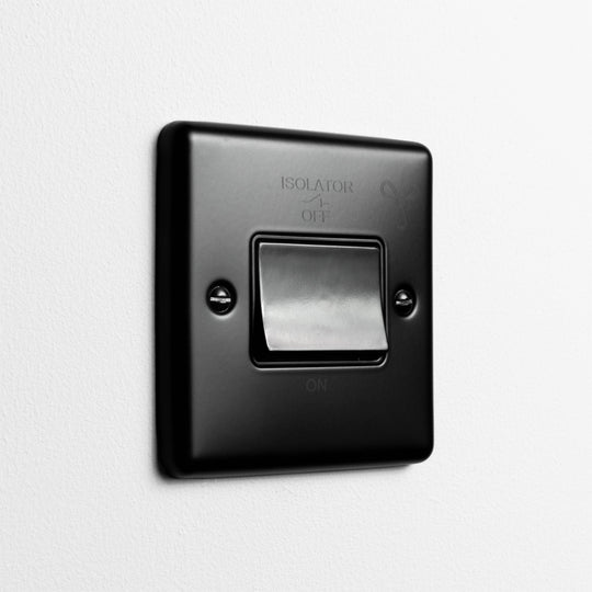 Matt Black 6A Fan Switch On A Light Grey Background