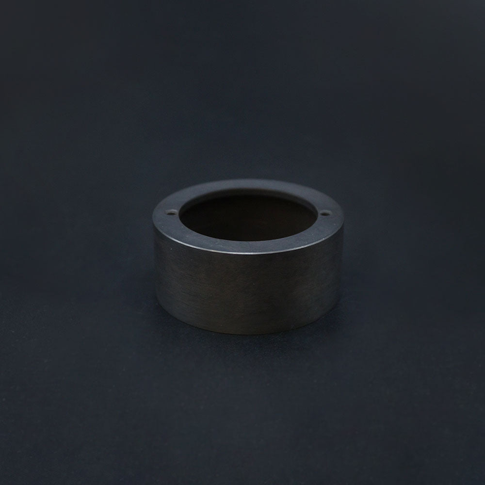 A dark bronze 20mm conduit loop in back box, displayed against a dark background.