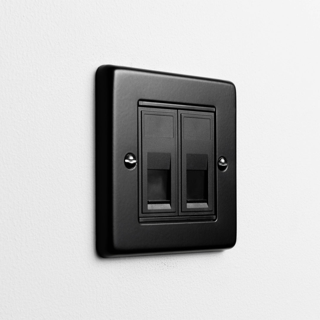 Matt Black 2 Gang RJ45 Socket On A Light Grey Background