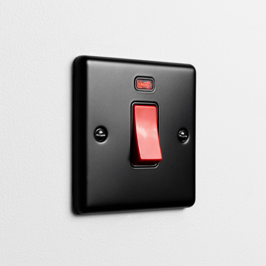 Matt Black 1 Gang 45A Double Pole Switch On Light Grey Background