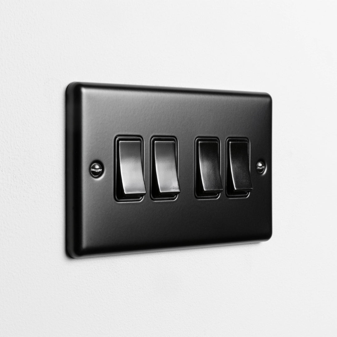 Matt Black 4 Gang 2 Way Switch On A Light Grey Background