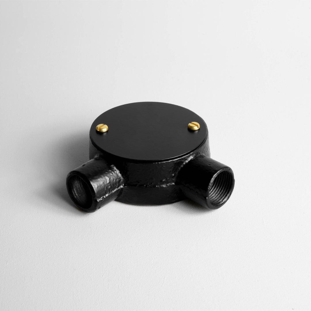 Matt Black 20mm Conduit Cross Box On Light Grey Background