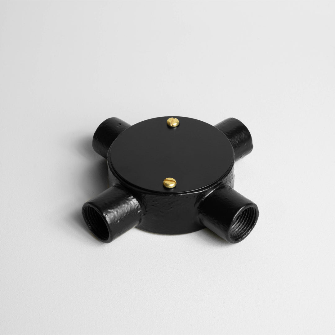 Matt Black 20mm Conduit Cross Box ON Light Grey Background
