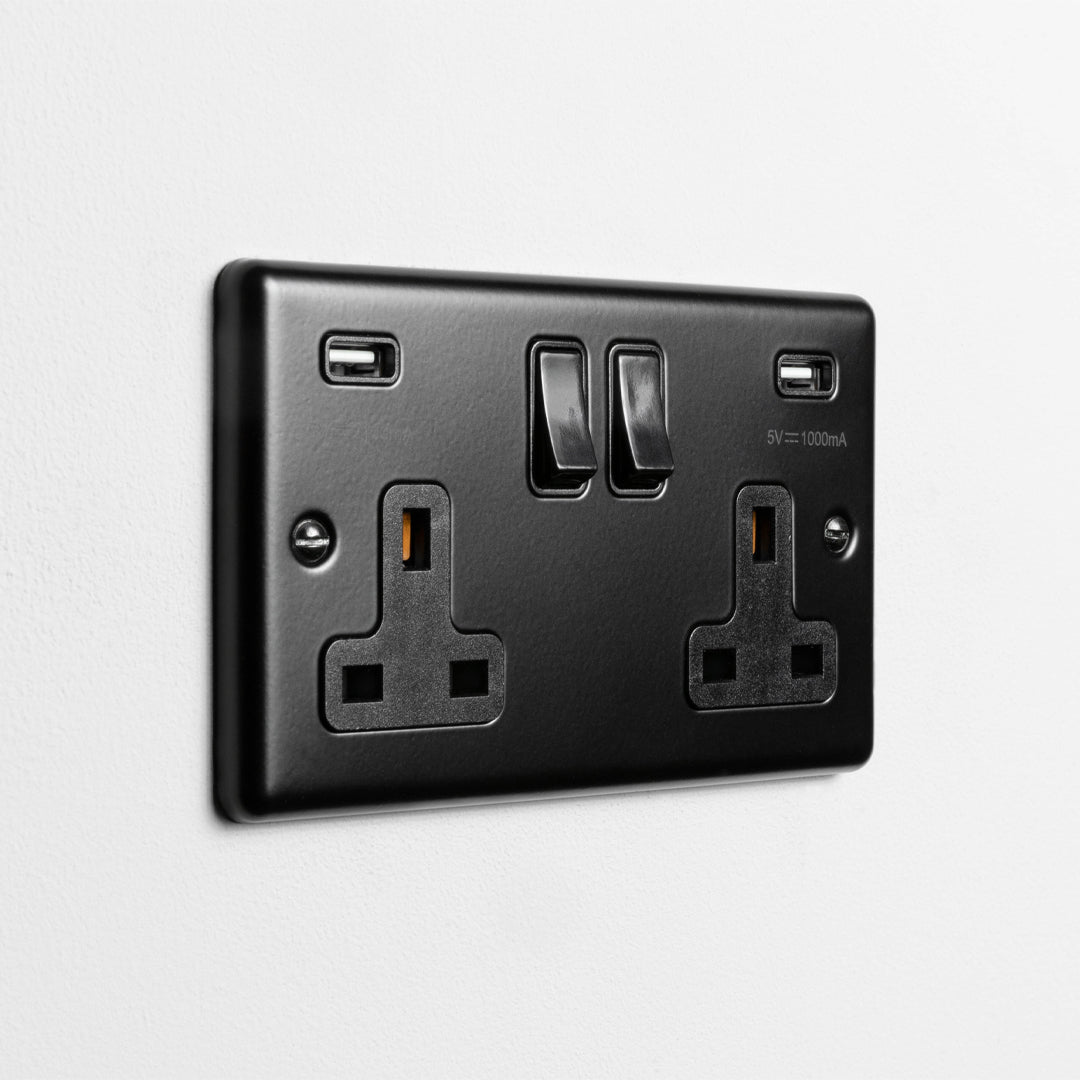 Matt Black Double Socket With Twin USB A On A Light Grey Background