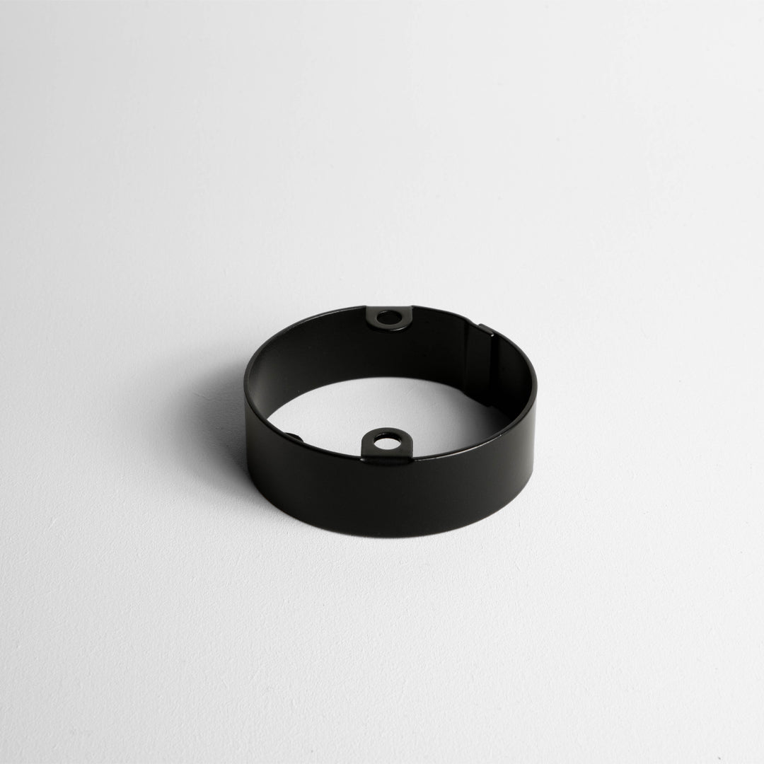 Matt Black Conduit Extension Ring On Light Grey Background