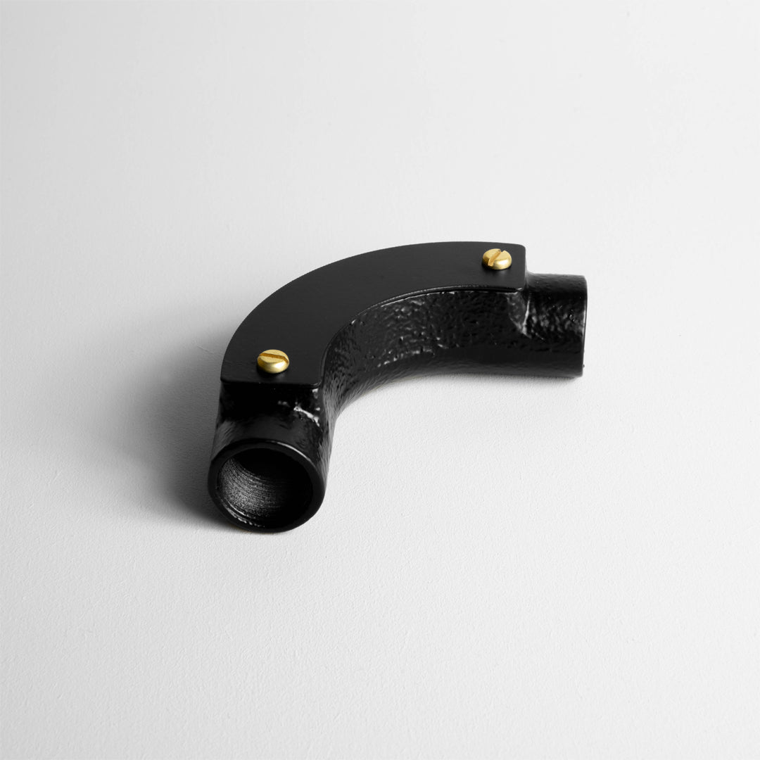 Matt Black 20mm Conduit Inspection Bend On A Light Grey Background