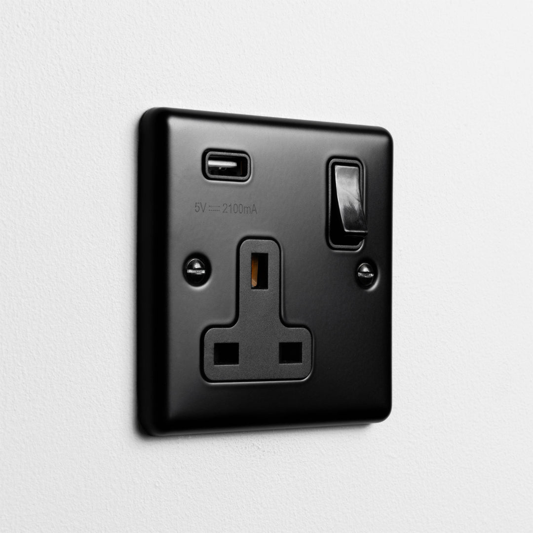 Matt Black Single Socket With USB On A Light Grey Background