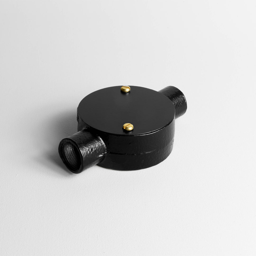 Matt Black 20mm Conduit Through Box On A Light Grey Background